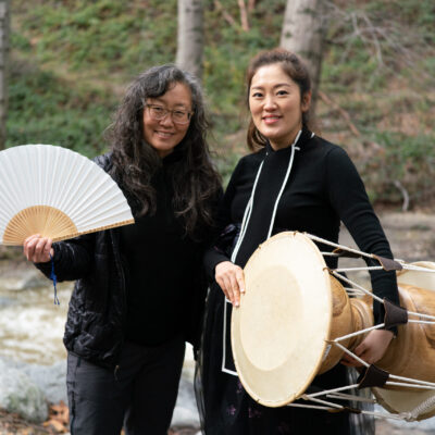 Site visit with Melody HyunJeong Sim (Shim) + Juli Jiyoung Kang in Los Angeles County, at the Switzer Falls Trailhead in the Angeles National Forest. January 11, 2023. Photos by Jennifer Joy Jameson and Chris Merchant.

Melody HyunJeong Sim (Shim), former Korean dance apprentice to DaEun Jung in 2019, returns to mentor Juli Kang in Korean Pansori Music.
Site visit with Melody HyunJeong Sim (Shim) + Juli Jiyoung Kang in Los Angeles County, at the Switzer Falls Trailhead in the Angeles National Forest. January 11, 2023. Photos by Jennifer Joy Jameson and Chris Merchant.

Melody HyunJeong Sim (Shim), former Korean dance apprentice to DaEun Jung in 2019, returns to mentor Juli Kang in Korean Pansori Music. Sim will guide Juli Jiyoung Kang in deepening her skills in Pansori (particularly in relation to voice and repertoire). Kang will also learn to compose Pansori and develop a performance reflecting the everyday stories of Korean immigrant/diasporic life in Los Angeles, which the pair will present at the end of the apprenticeship, introducing new audiences to Pansori.