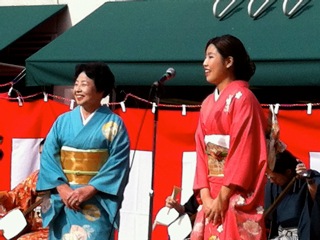 Master Minyo singer Matsutoyo Sato with her 2013 apprentice Nana Kaneko at a New Year's performance in L.A.'s Little Tokyo in 2013.
